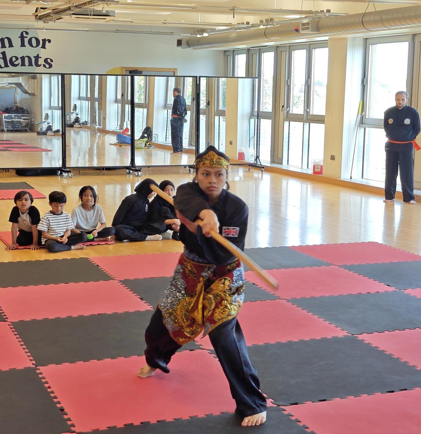 Hanisah Rizaudin performing Jurus Tunggal with Toya at Bristol University — May 2026